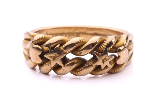 Lot 42 - A dress ring in 18ct yellow gold, of twisted...
