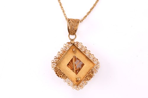Lot 182 - Two pendants on chain and another; the rhombic...