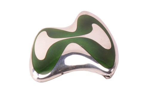Lot 256 - Georg Jensen - an enamel brooch with green...