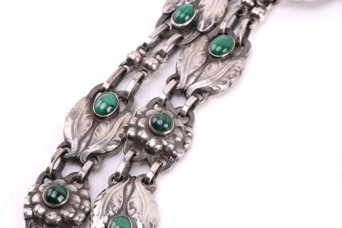 Lot 265 - Georg Jensen - a double-strand floral necklace...