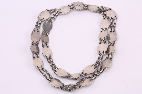 Lot 265 - Georg Jensen - a double-strand floral necklace...