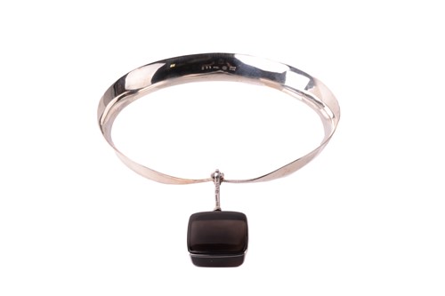 Lot 254 - Georg Jensen - 'Neck Ring' with square smoky...