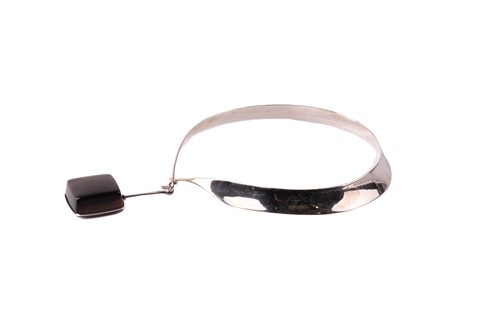 Lot 254 - Georg Jensen - 'Neck Ring' with square smoky...
