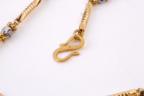 Lot 158 - A three-toned bar link chain necklace and...