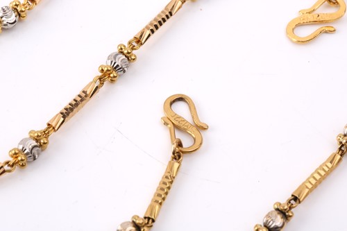 Lot 158 - A three-toned bar link chain necklace and...