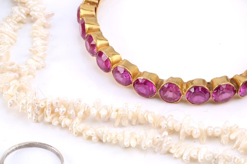 Lot 209 - A pink synthetic sapphire suite in gold plated...
