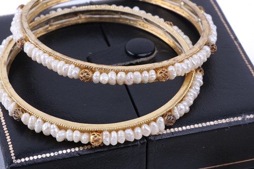 Lot 209 - A pink synthetic sapphire suite in gold plated...