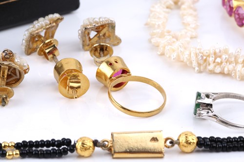 Lot 209 - A pink synthetic sapphire suite in gold plated...