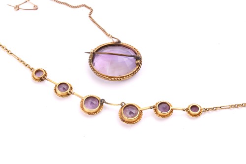 Lot 107 - An amethyst necklace and a matching brooch;...