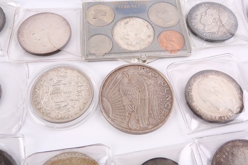 Lot 284 - A collection of silver content world coins,...