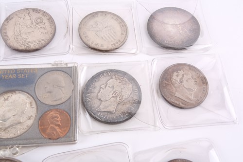 Lot 284 - A collection of silver content world coins,...