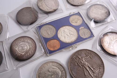 Lot 284 - A collection of silver content world coins,...