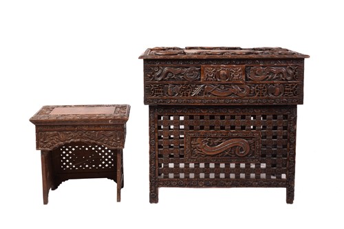 Lot 357 - A Chinese carved hardwood centre table, the...