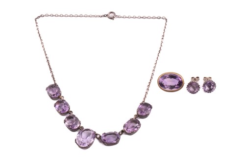 Lot 227 - An amethyst demi riviere necklace with a...