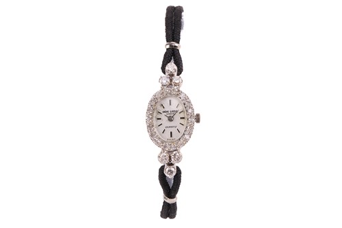 Lot 377 - An Andre Giroud diamond set watch and an 18ct...