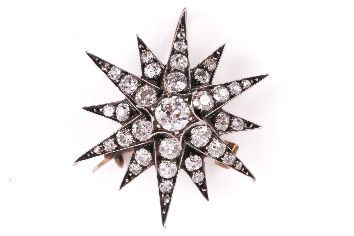 Lot 151 - A Victorian diamond star brooch, designed as a...