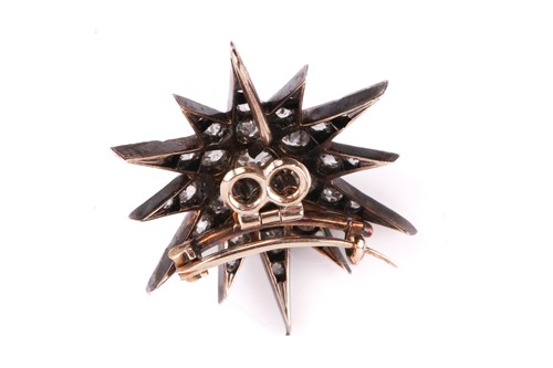 Lot 151 - A Victorian diamond star brooch, designed as a...