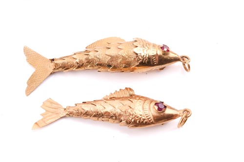 Lot 118 - Two articulated fish pendants in yellow metal...
