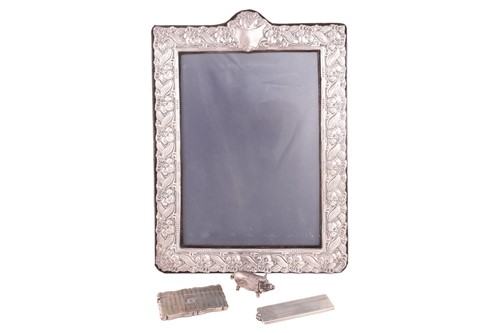 Lot 432 - A 20th-century silver easel-back photo frame,...