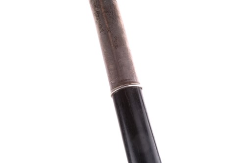 Lot 537 - An ebonised walking stick with white metal...