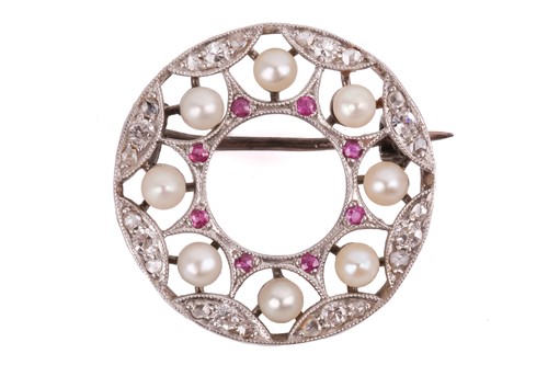 Lot 131 - An Art Deco pearl, diamond and ruby circlet...