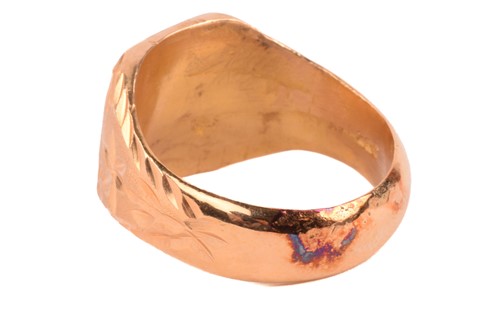 Lot 186 - A signet ring of floral design, the...