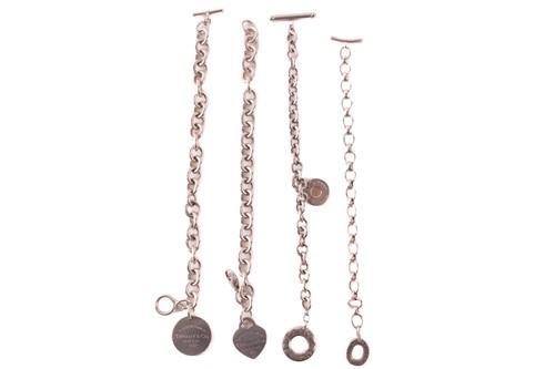 Lot 290 - Three Tiffany & co. cable link bracelets with...
