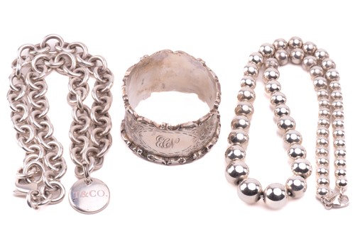 Lot 27 - Two Tiffany & Co. silver necklaces and a...