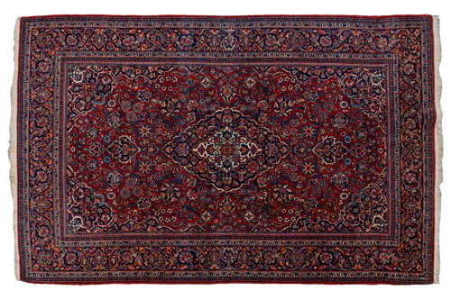 Lot 371 - A Kashan rug, with central mandorla and...