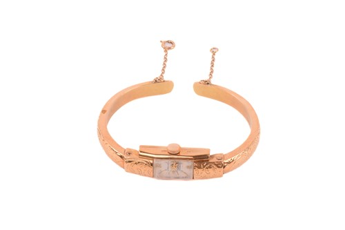 Lot 421 - An 18ct gold Pallas lady's dress watch,...
