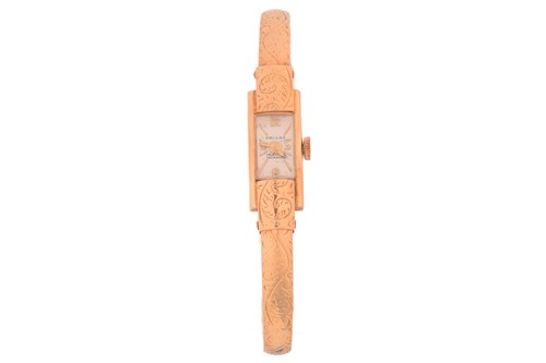 Lot 421 - An 18ct gold Pallas lady's dress watch,...