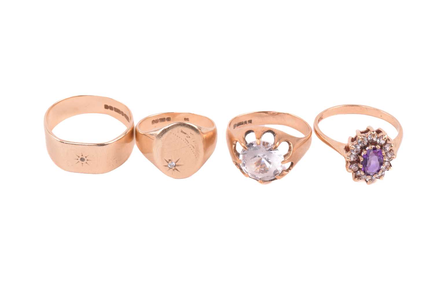 Four Rngs Lot 215 - Four rings, all in 9ct gold, including an