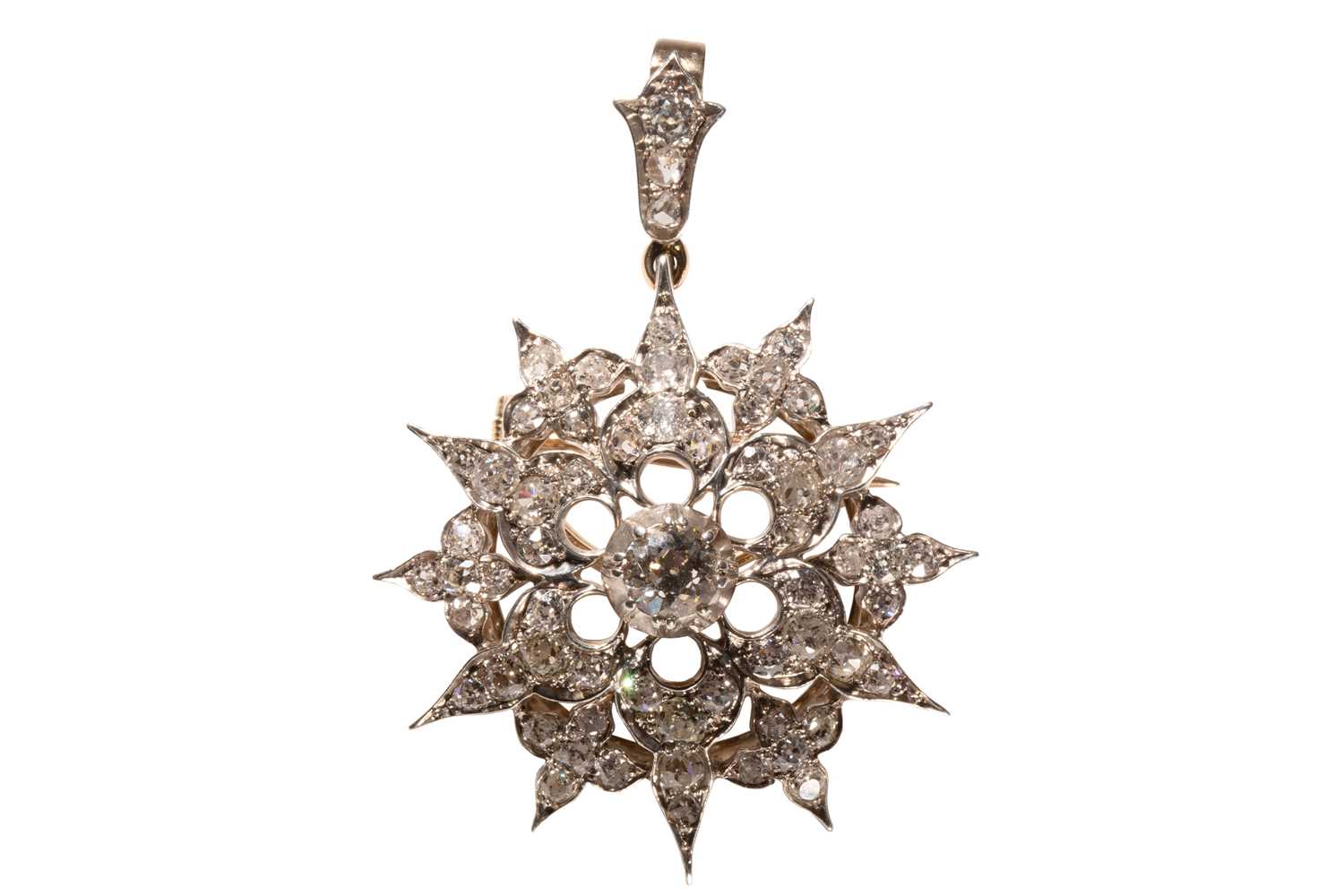 Lot 36 - A Victorian style diamond star brooch/pendant,...