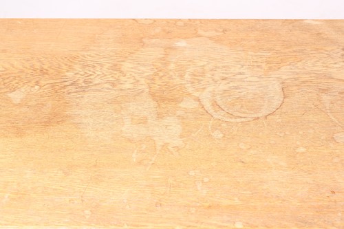 Lot 159 - An Arts & Crafts style oak double-sided low...