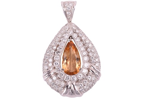 Lot 149 - A diamond and citrine pendant in platinum,...