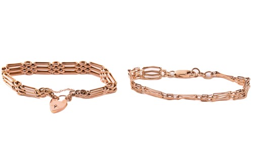 Lot 4 - Two 9ct yellow gold gate link bracelets;...
