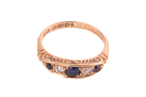 Lot 145 - A sapphire and diamond five stone ring, the...