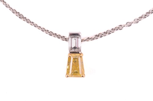 Lot 42 - A yellow diamond pendant on an 18ct gold chain,...