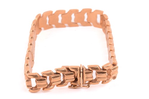 Lot 3 - A chevron link bracelet, hinged links of...
