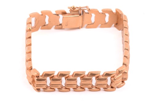 Lot 3 - A chevron link bracelet, hinged links of...