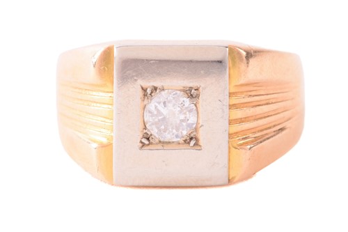 Lot 104 - A diamond-set signet ring, the square head...