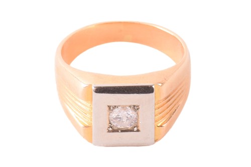 Lot 104 - A diamond-set signet ring, the square head...