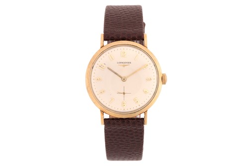 Lot 433 - A Longines classic watch, featuring a...