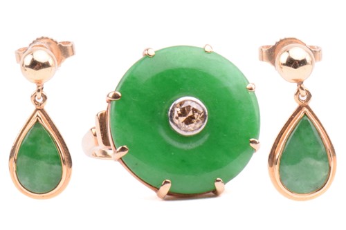 Lot 64 - A jade and diamond dress ring; the circular...