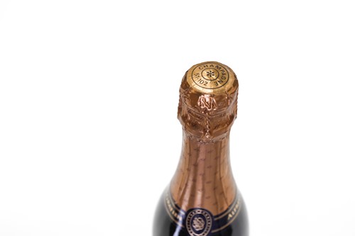 Lot 20 - Four bottles of 1990 Taittinger Millesime...