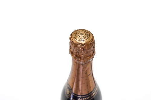Lot 20 - Four bottles of 1990 Taittinger Millesime...