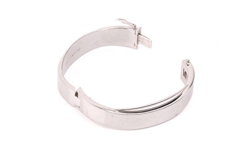 Lot 181 - Montblanc - a silver hinged bangle, with an...