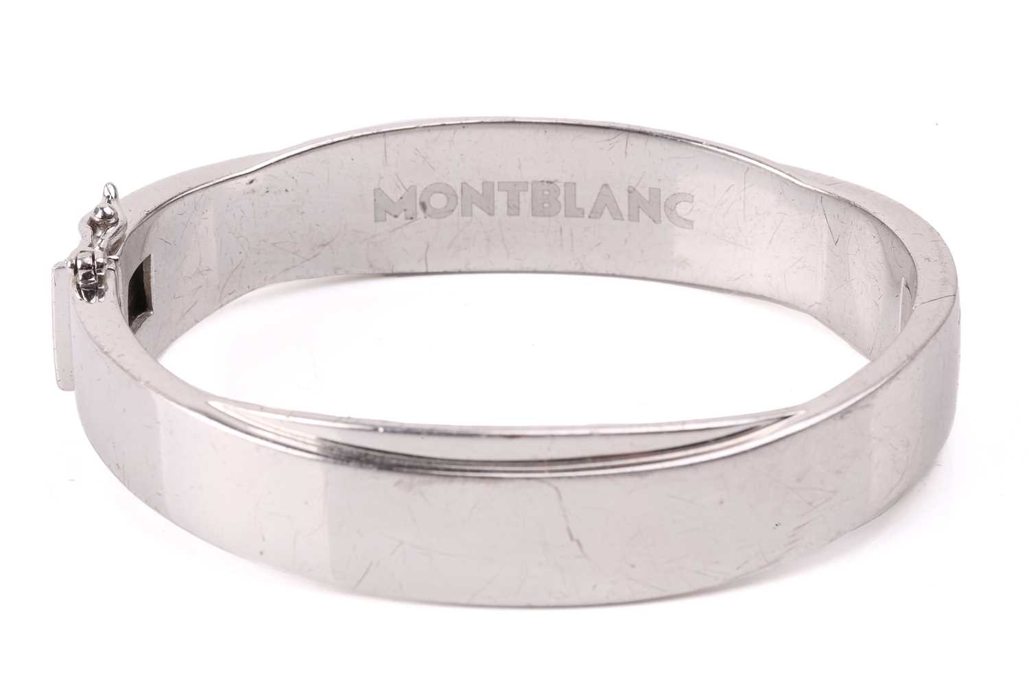 Lot 181 - Montblanc - a silver hinged bangle, with an...