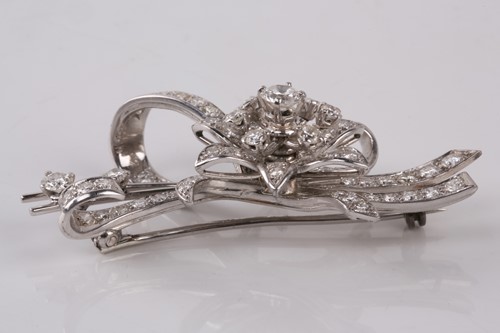 Lot 18 - A diamond floral brooch by Cropp and Farr,...