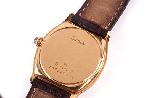 Lot 400 - Cartier. An 18 carat gold Tortue watch. The...